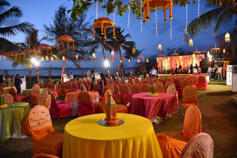Photo of Yellow Table Decor with Colorful Lanterns