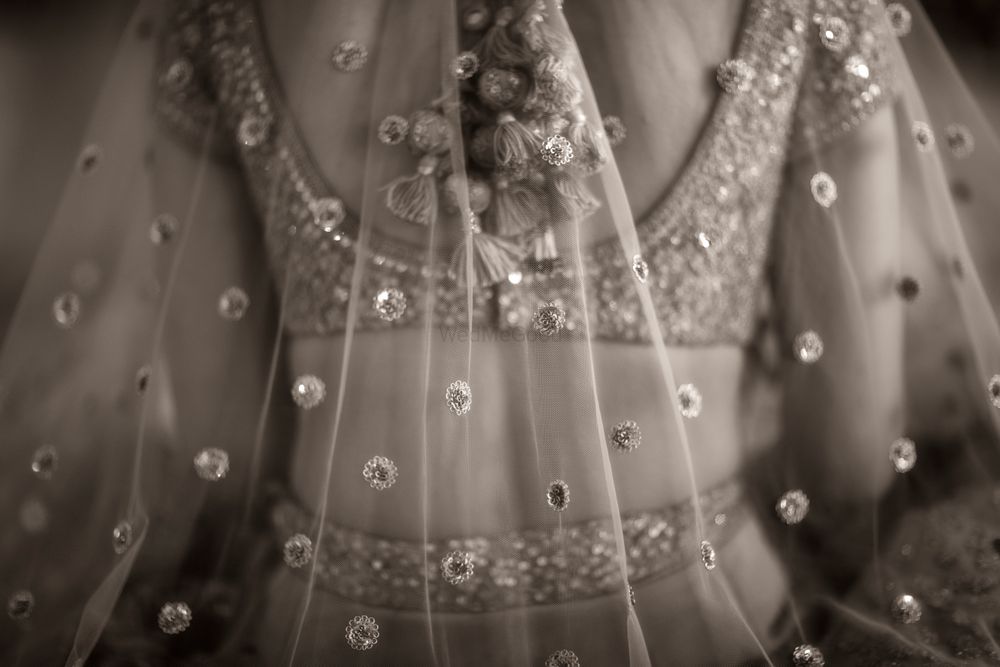 Photo of bridal close up shot with lehenga latkans in black and white