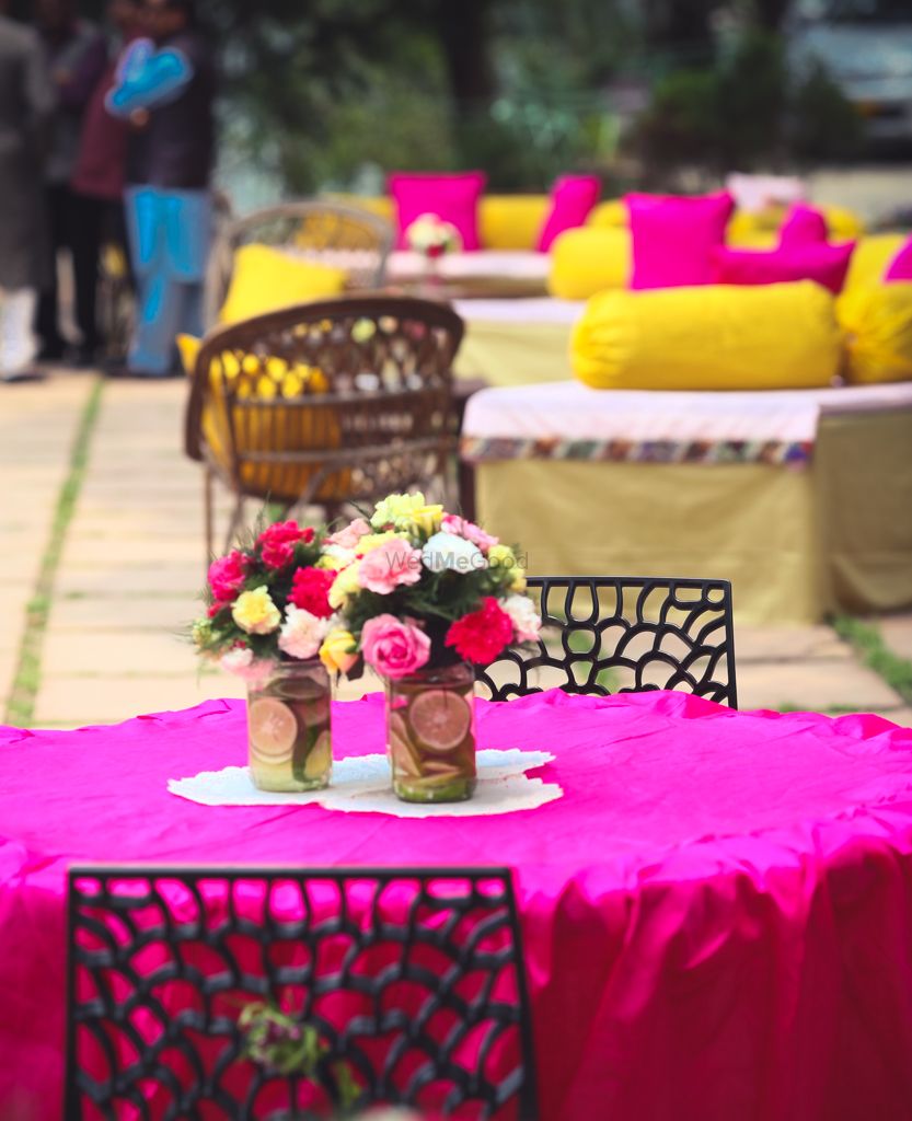 Photo of Pink Table Decor with Floral Centerpiece