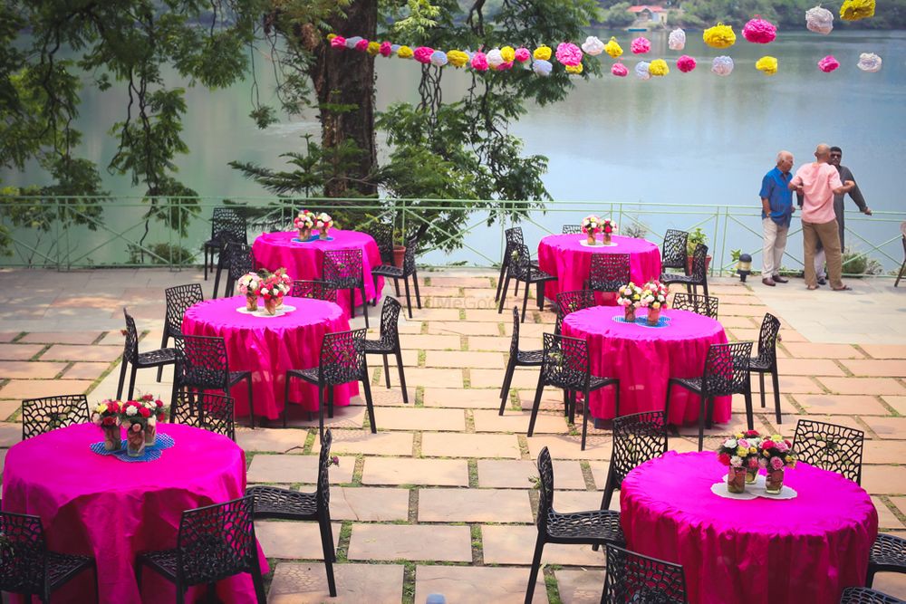 Photo of Hot Pink Table Decor with Floral Centerpiece