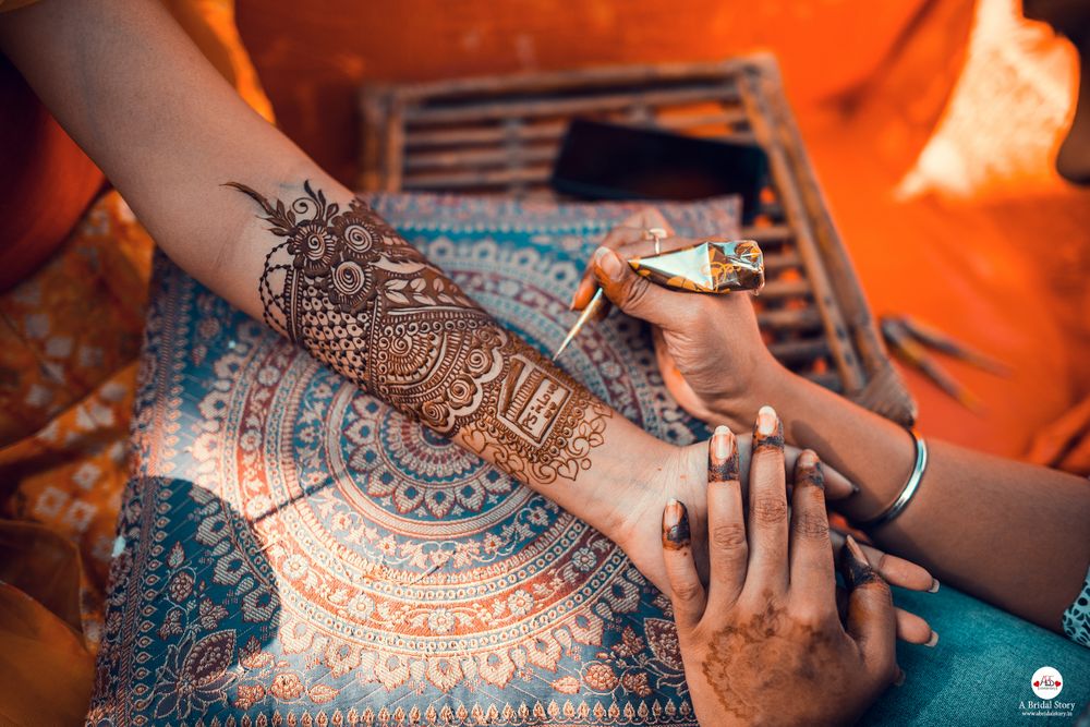 Photo of A mehndi design with a personalized text.