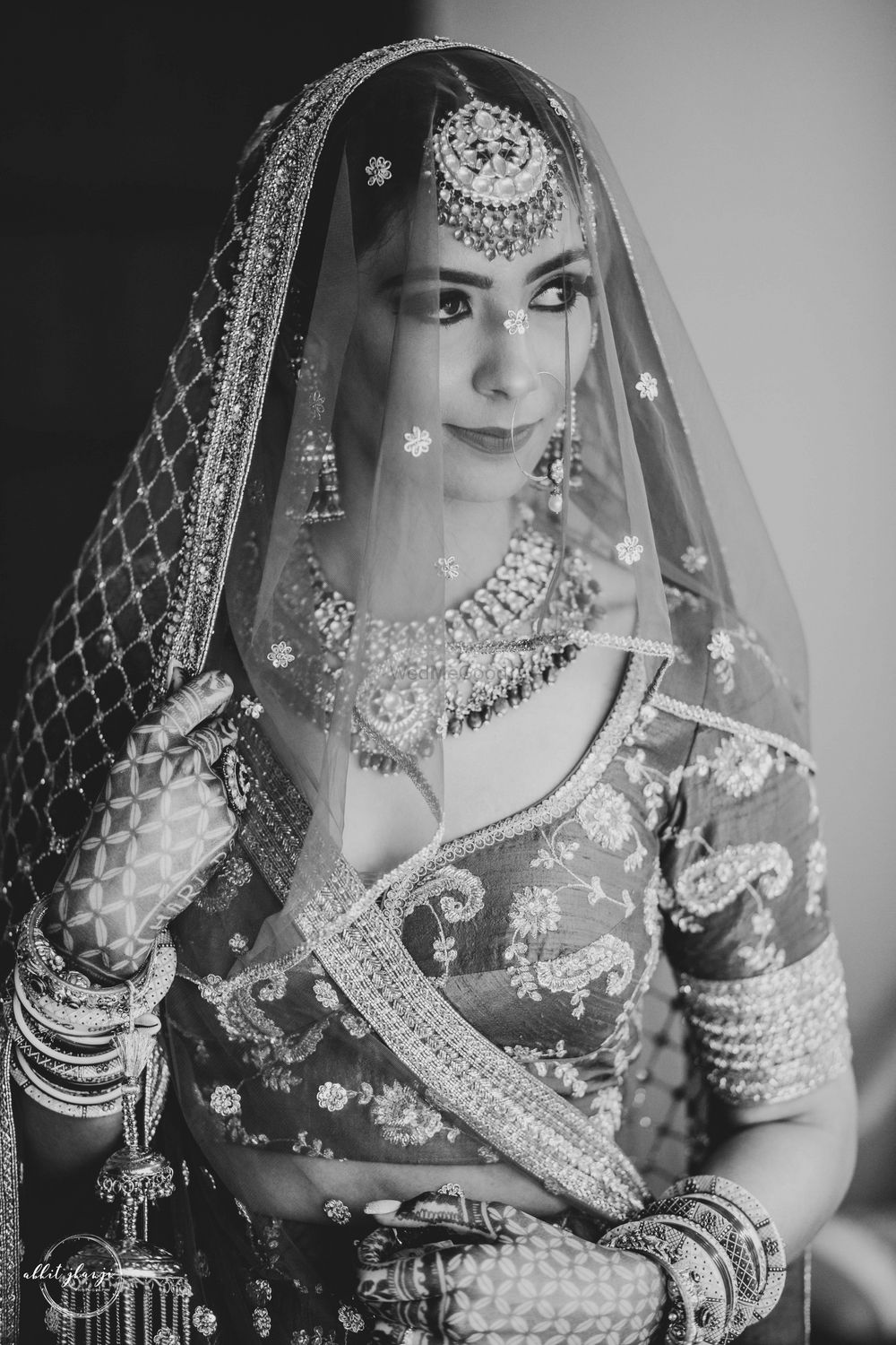 Photo of black and white bridal photo in sabya lehenga