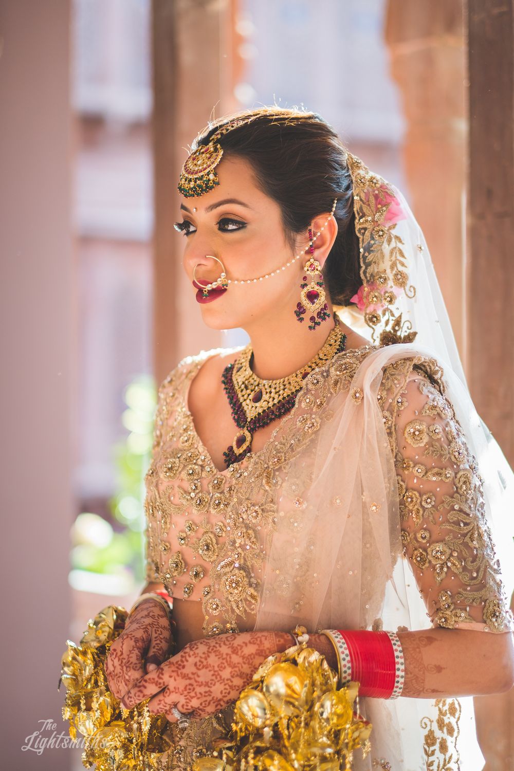 Photo of A beautiful bride with minimal makeup and jewellery.