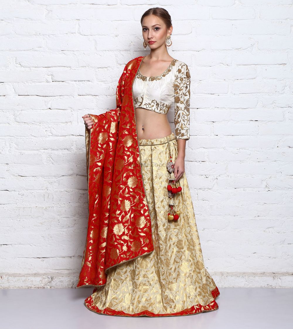 Photo of White and Gold Lehenga with Red Silk Dupatta