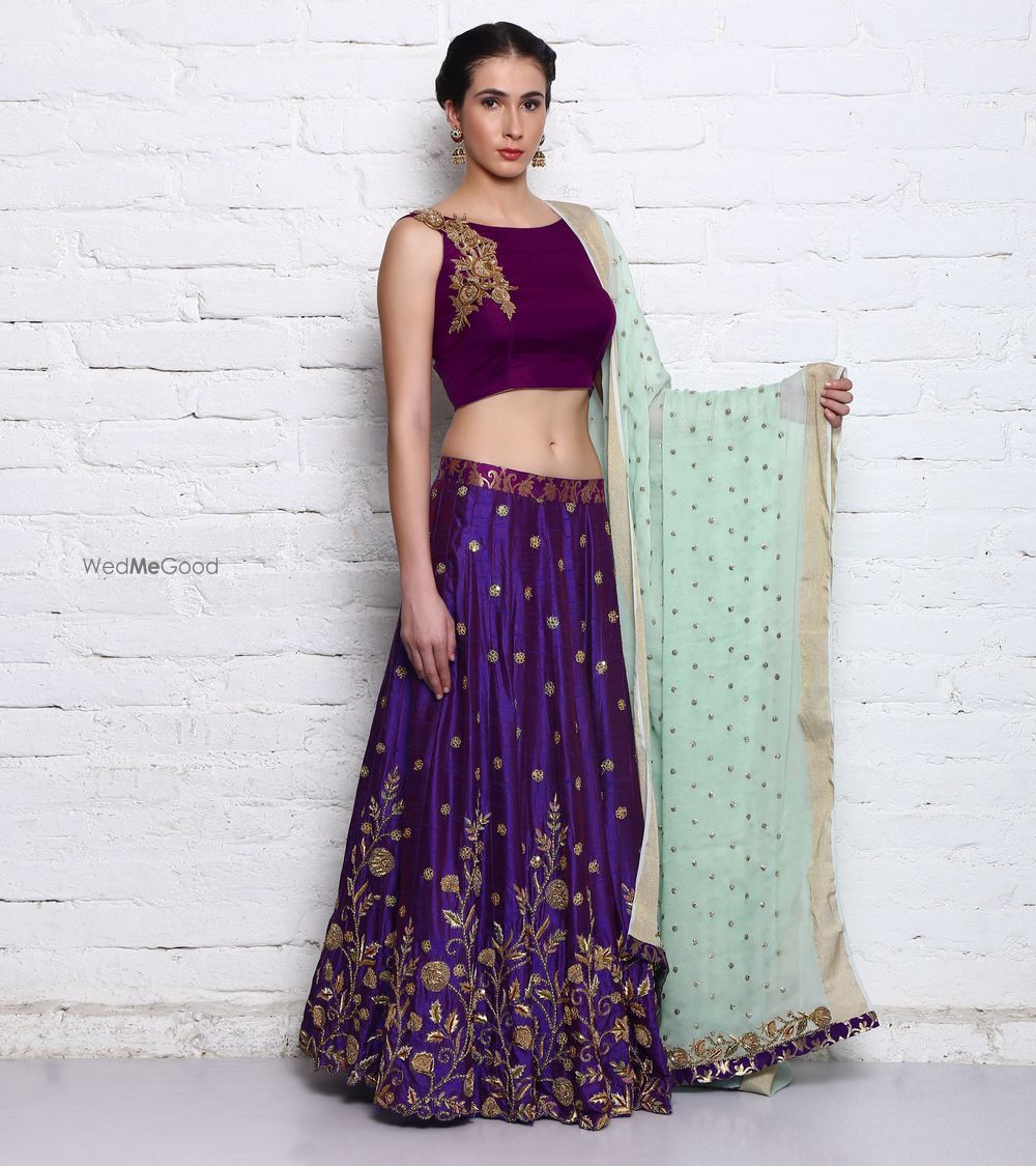 Photo of Purple and Gold Lehenga with Mint Dupatta