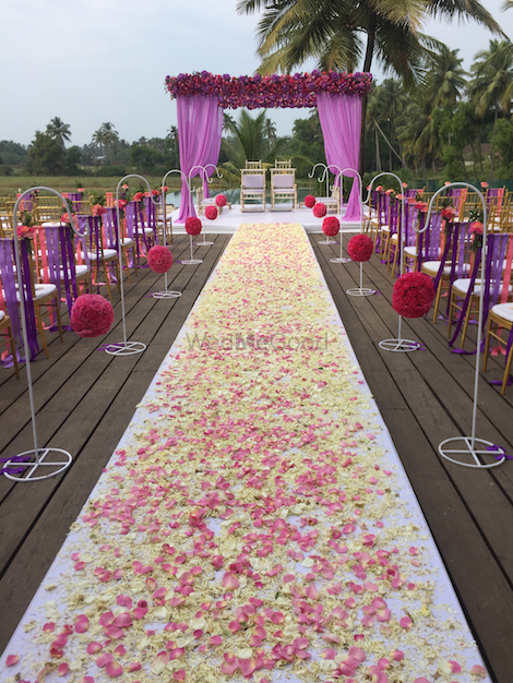 Photo of Purple Mandap with Rose Decor