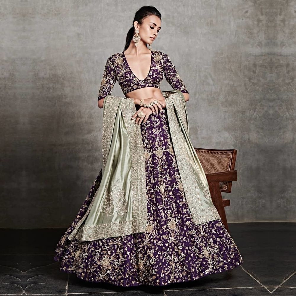 Photo of embroidered purple lehenga for reception with heavy work