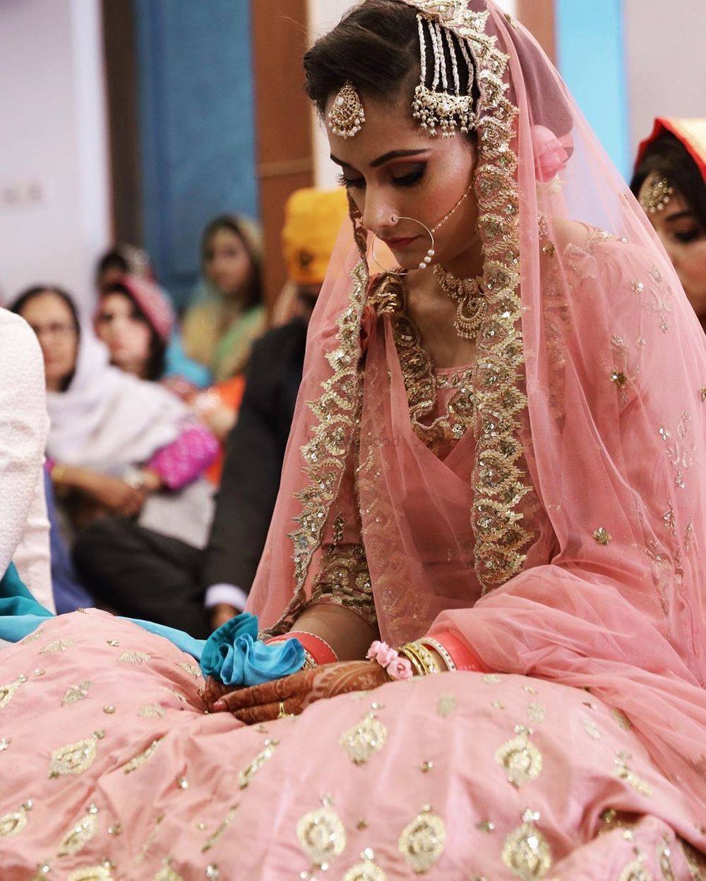 Photo of A beautiful bridal portrait of a bride during anand karaj