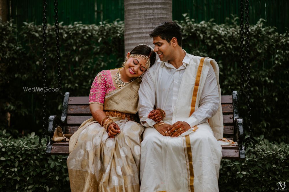 Photo of A happy couple enjoying a moment post their wedding ceremony.