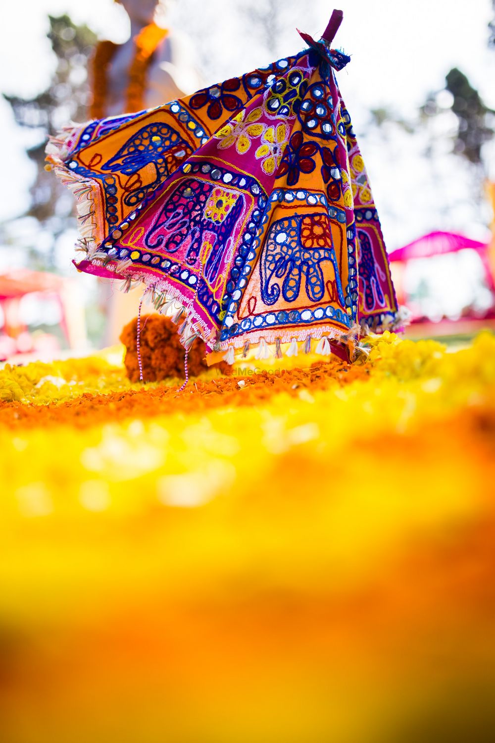 Photo of Rajasthani umbrella mehendi decor