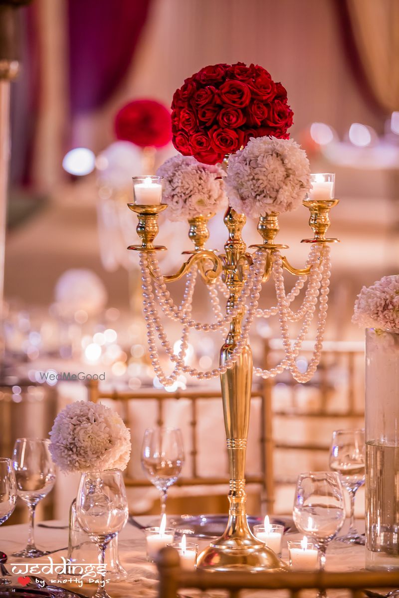 Photo of Gold Candelabras with Red Roses Table Centerpiece