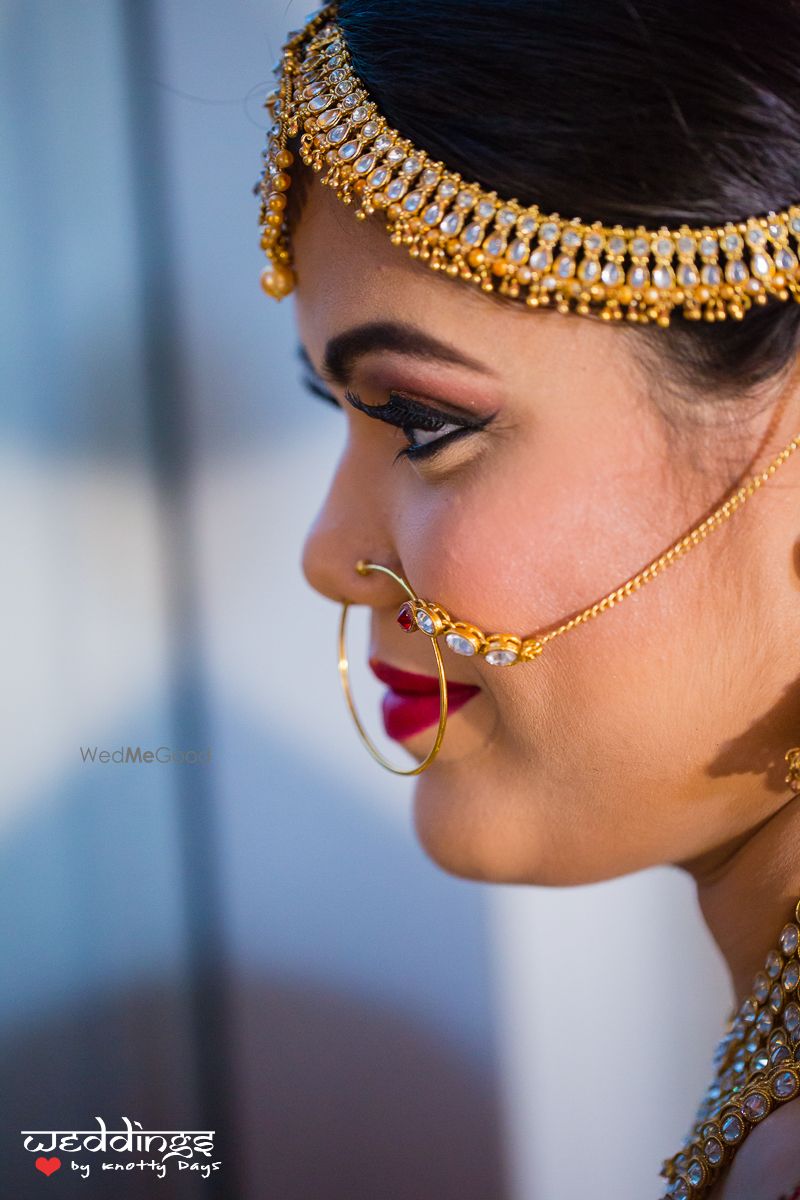 Photo of Gold Mathapatti with Diamond Studs