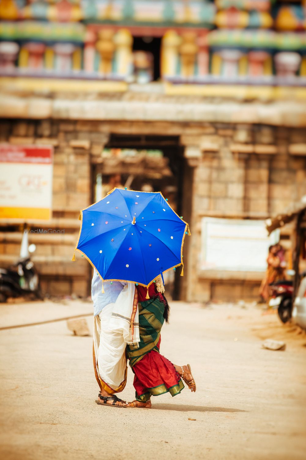 Photo of Couple Under The Umbrella Shot