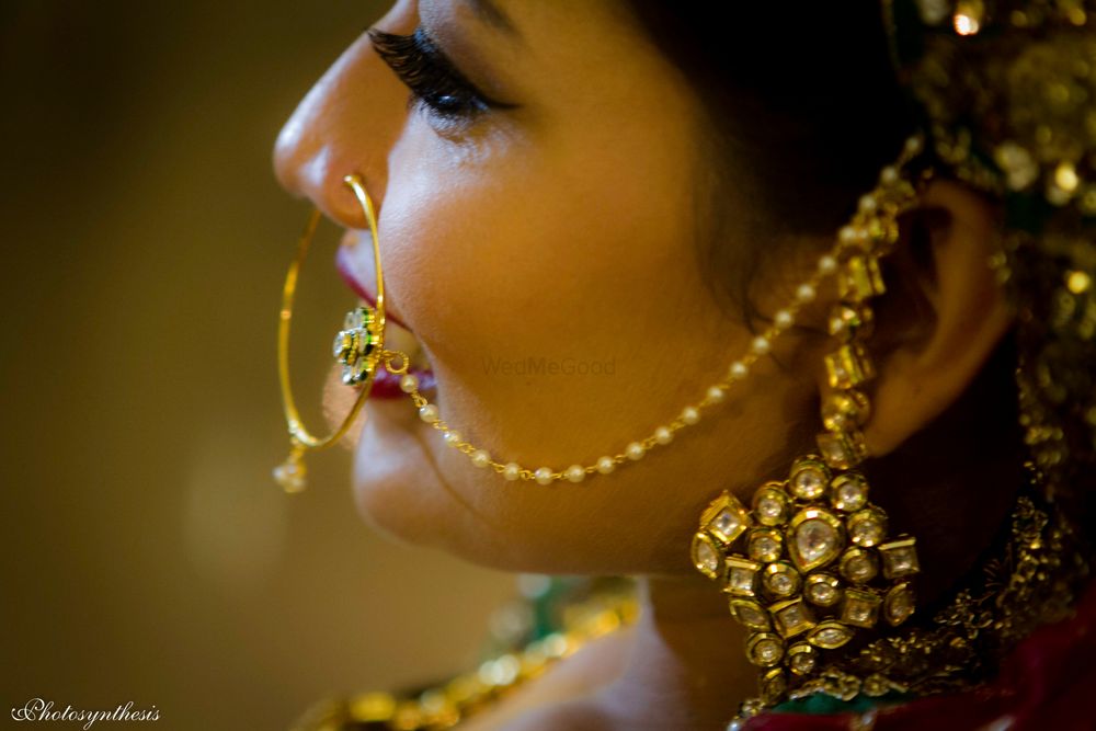 Photo of Polki Earrings with Gold Nosering