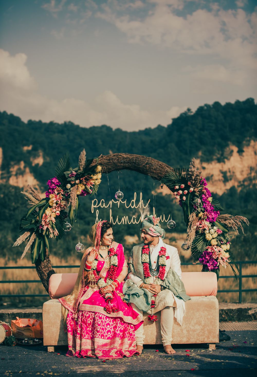 Photo of intimate wedding decor stage backdrop in the hills