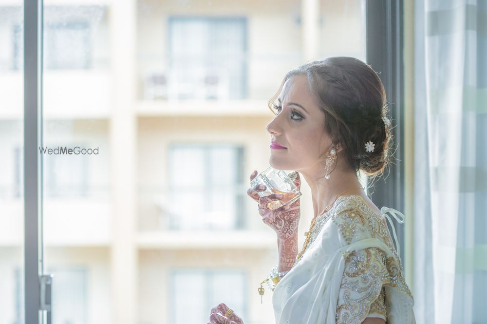 Photo of Bride Wearing Perfume Shot