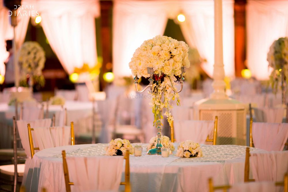 Photo of White Table Settings Decor - Floral Candelabras