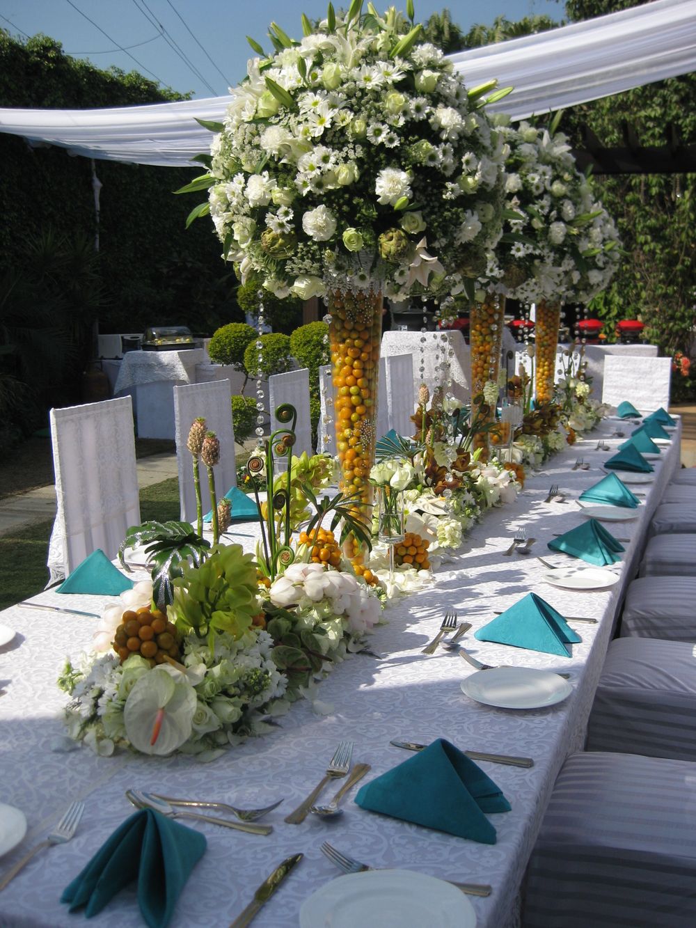 Photo of White and Yellow Floral Centerpiece