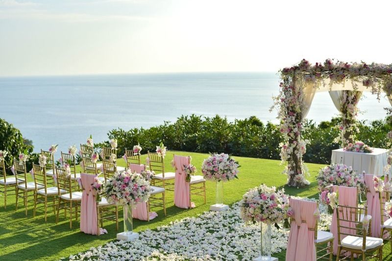 Photo of A gorgeous mandap by the sea in tones of baby pink and white