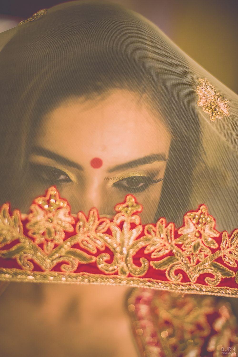 Photo of Bride in Veil - Cream and Red Dupatta