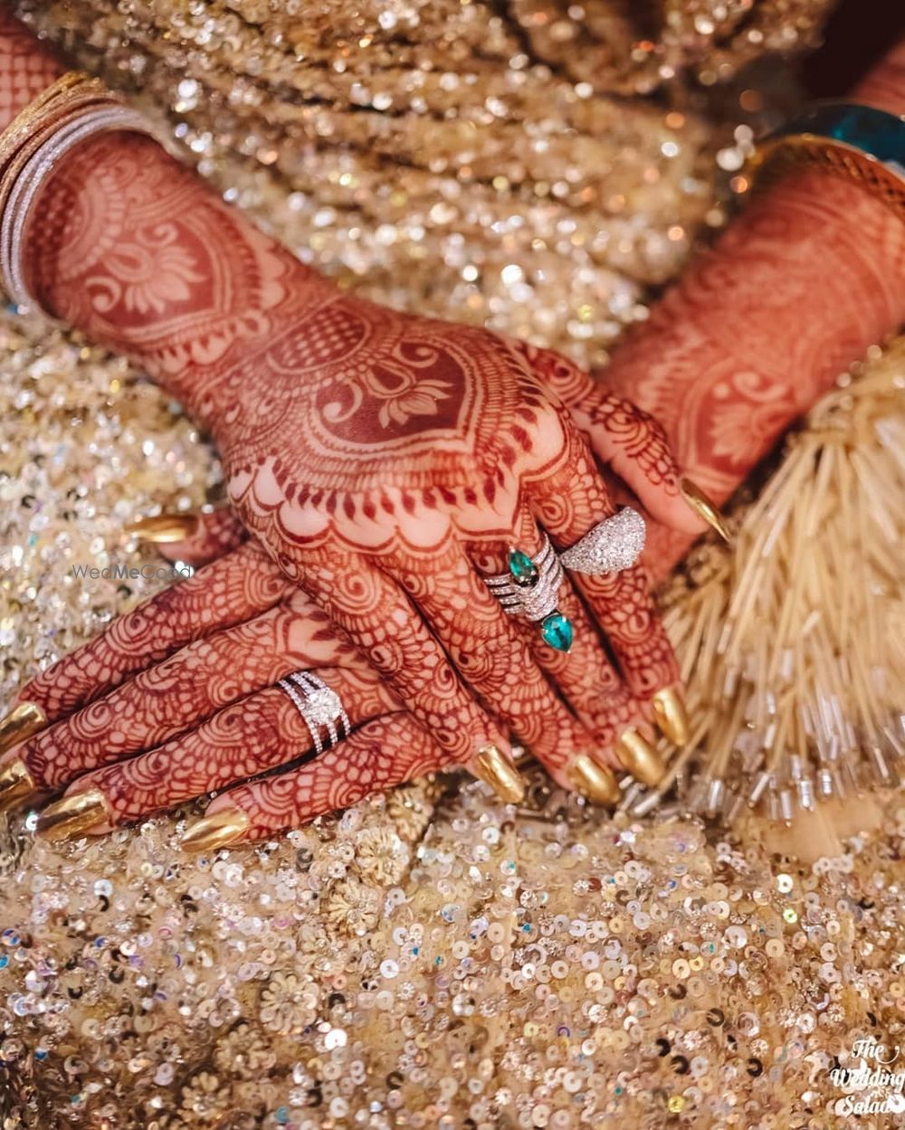 Photo of Portrait of a bride wearing stunning diamond rings.