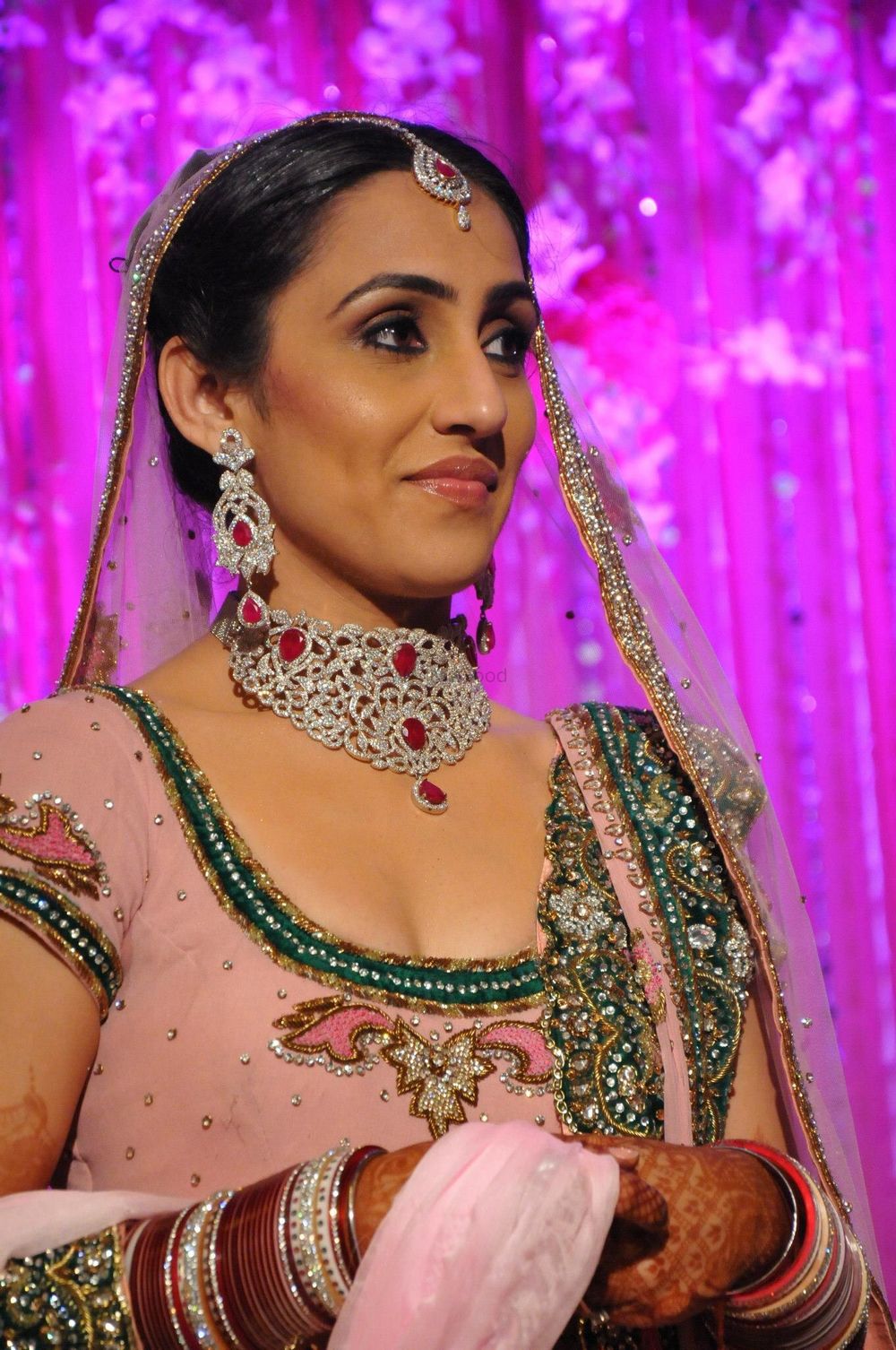 Photo of Bride in Pastel Pink and Green Lehenga