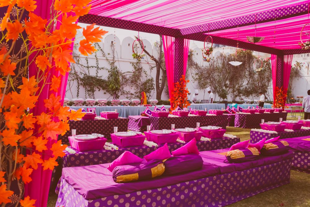 Photo of Purple Low Seating Decor with Fall Leaves for Mehendi