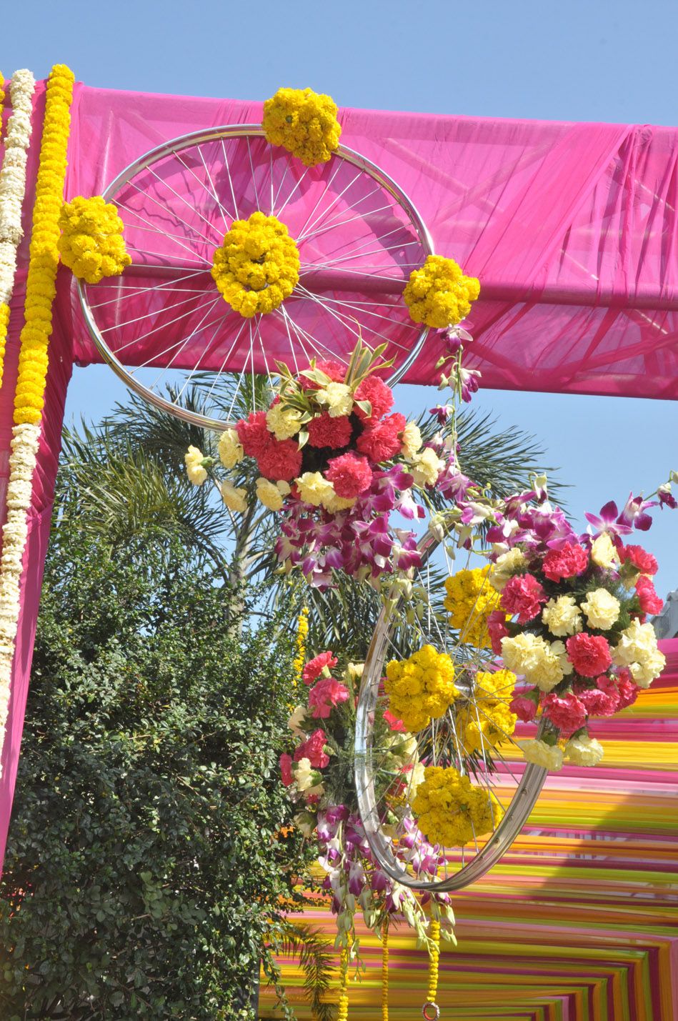Photo of wheels with flower arrangements
