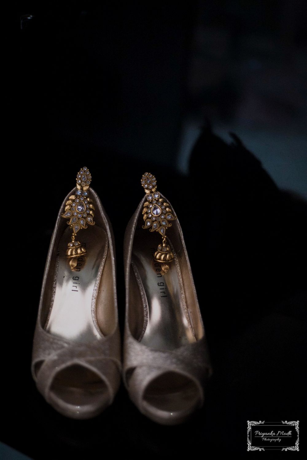 Photo of Silver Peep Toes and Gold Kundan Earrings