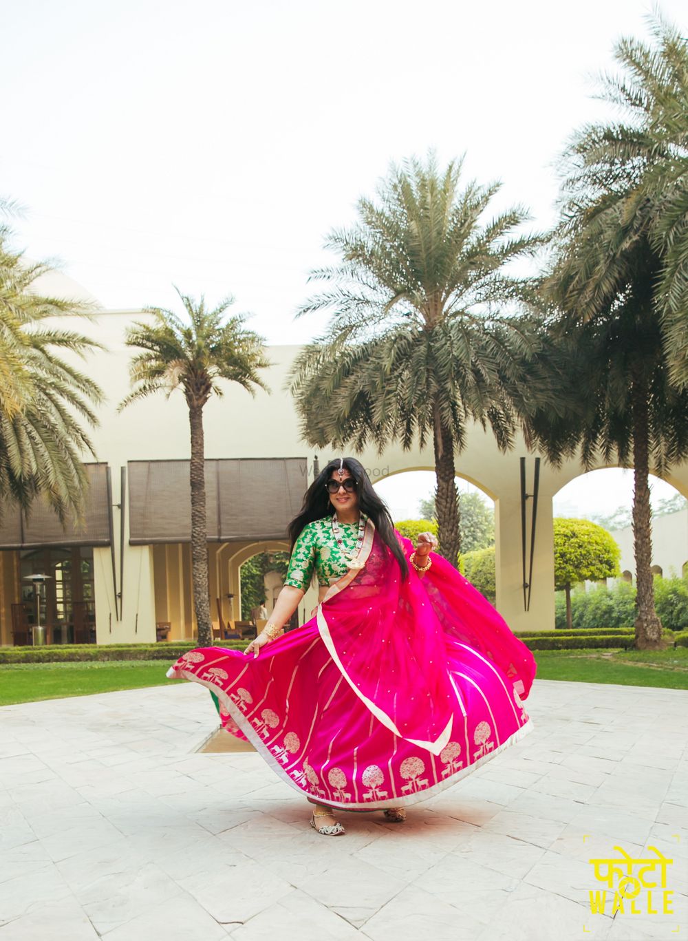 Photo of Parrot Green and Pink Twirling Lehenga