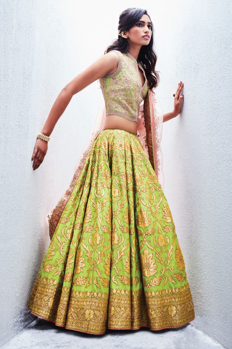 Photo of Fluorescent Green Lehenga with Gold Work