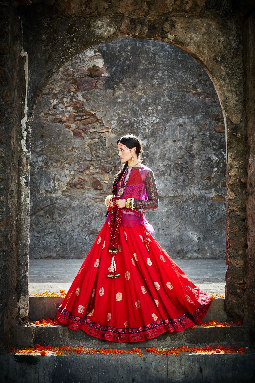 Photo of Hot Pink Blouse with Bright Red and Gold Lehenga