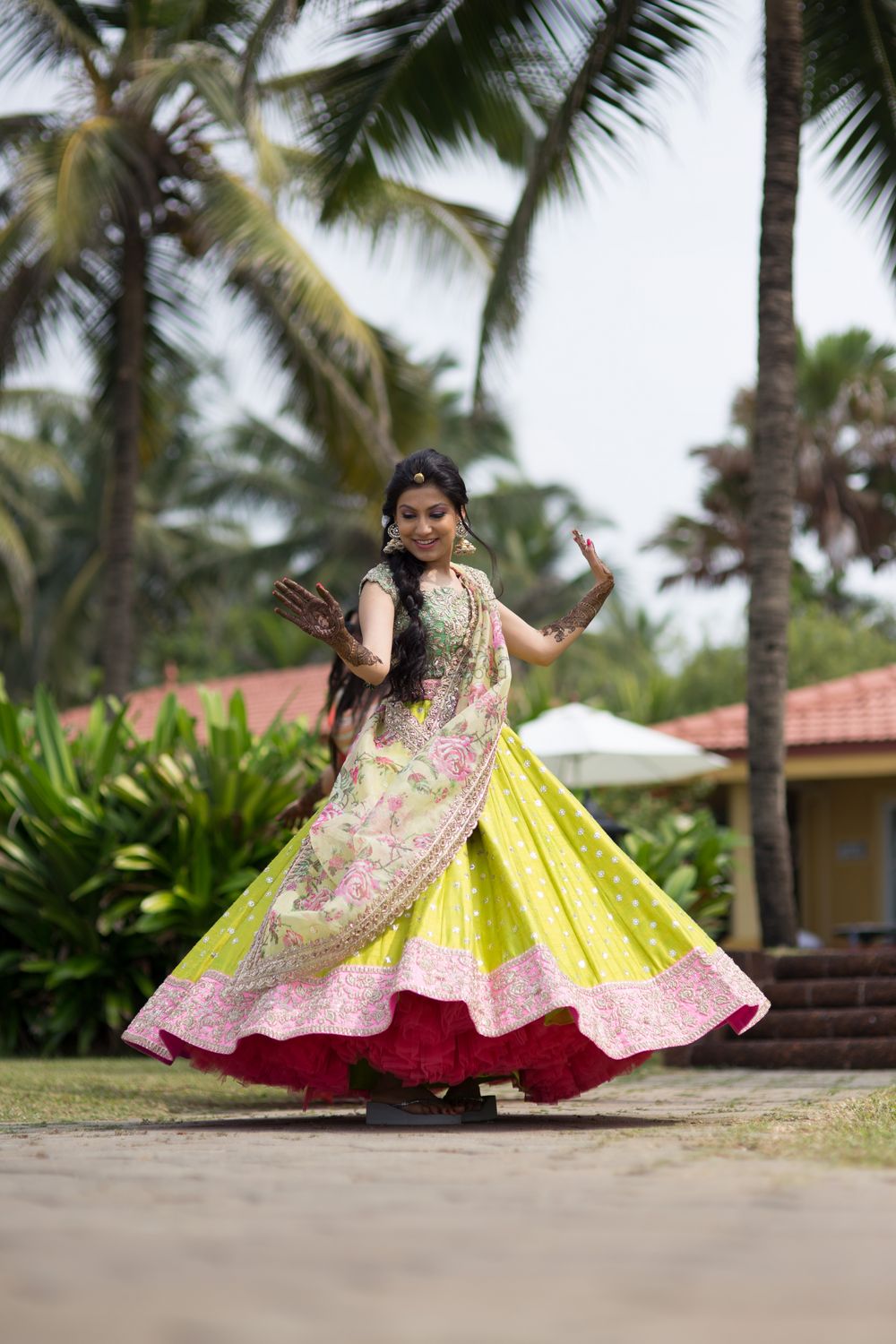 Photo of Floral Print and Neon Yellow Twirling Lehenga