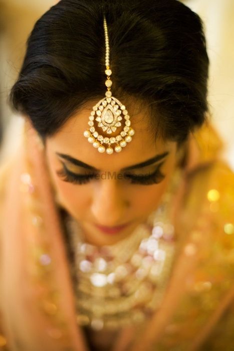 Photo of Gold Maangtikka with Diamonds and Pearl Drops