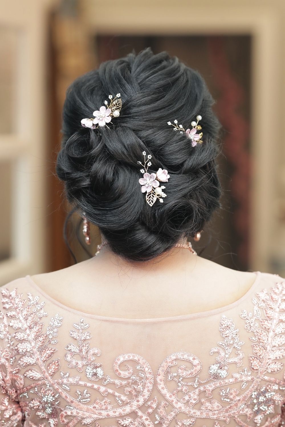Photo of An elegant bun hairstyle for engagement