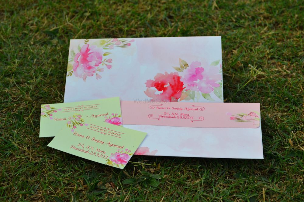 Photo of Floral print invitation cards with watercolor print