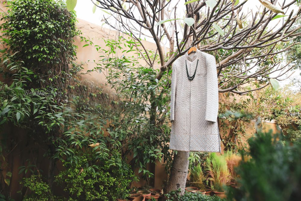 Photo of Groom sherwani on a hanger