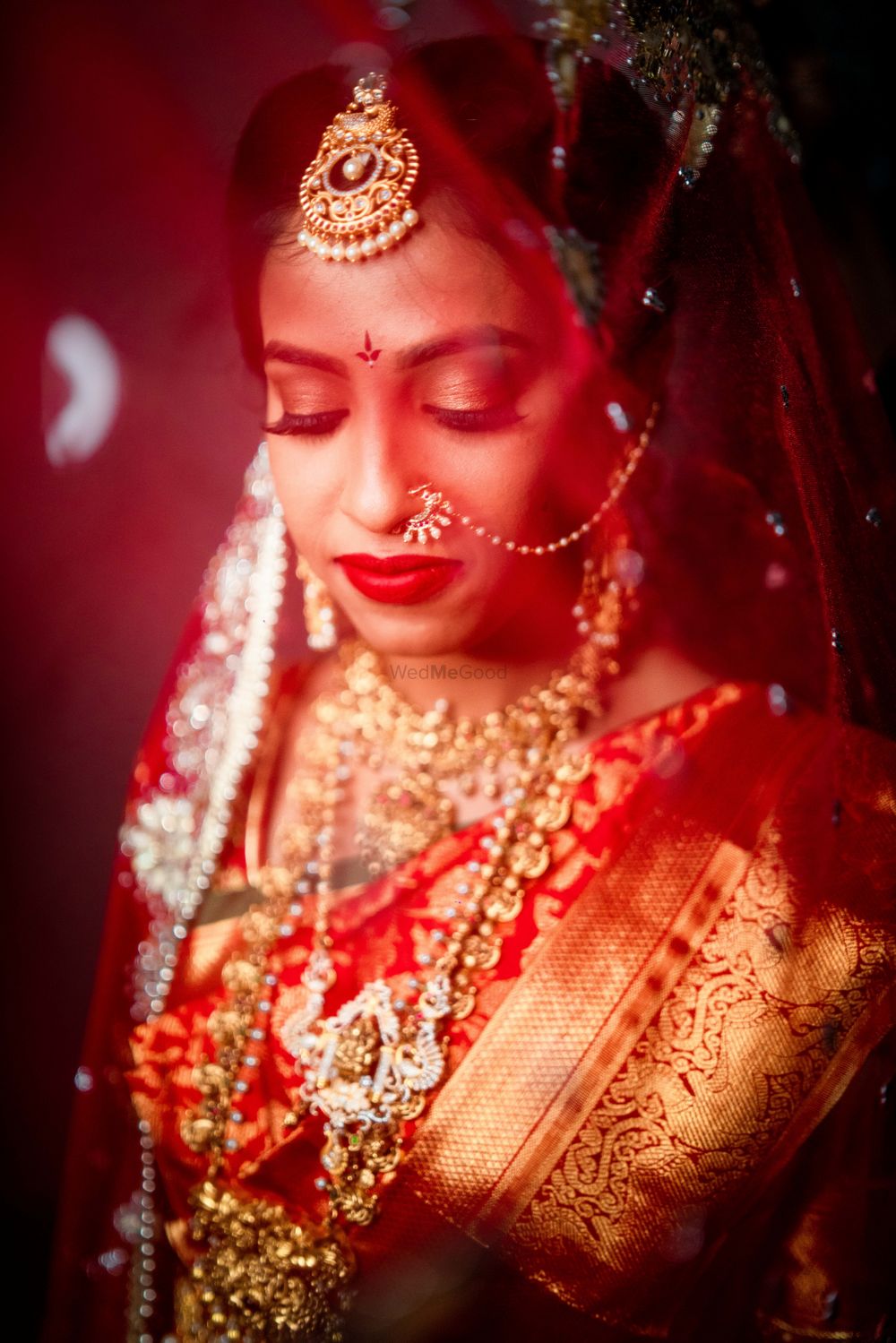 Photo of South Indian bride under a veil