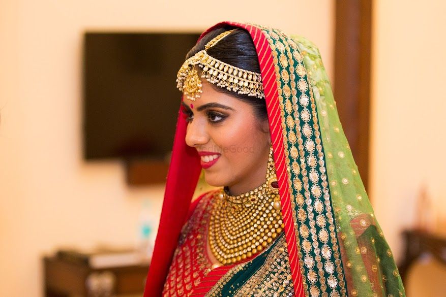 Photo of Candid Smiling Bride in Light Green Dupatta