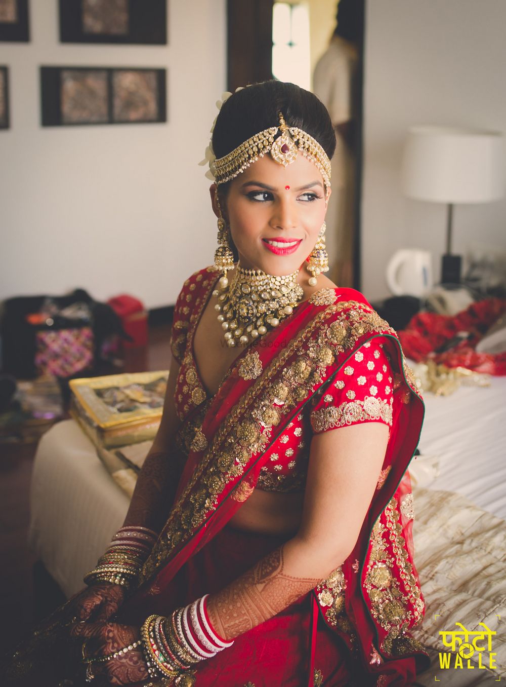 Photo of Red Bride in Gold Ruby Mathapatti and Necklace