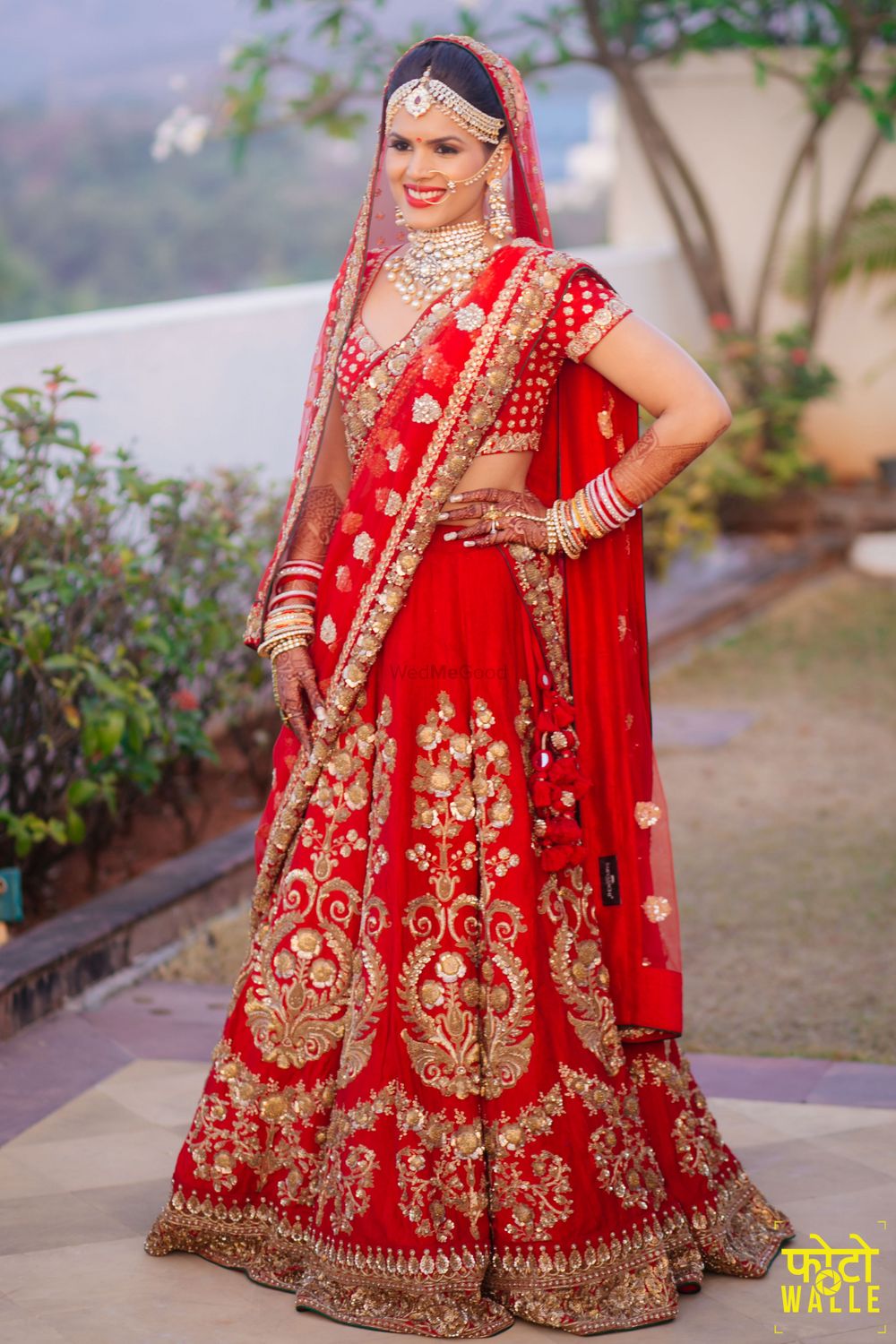 Photo of Red Bridal Lehenga with Gold Zari Embroidery
