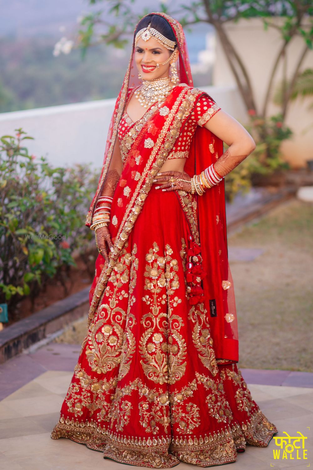 Photo of Red Bridal Lehenga with Gold Zari Embroidery