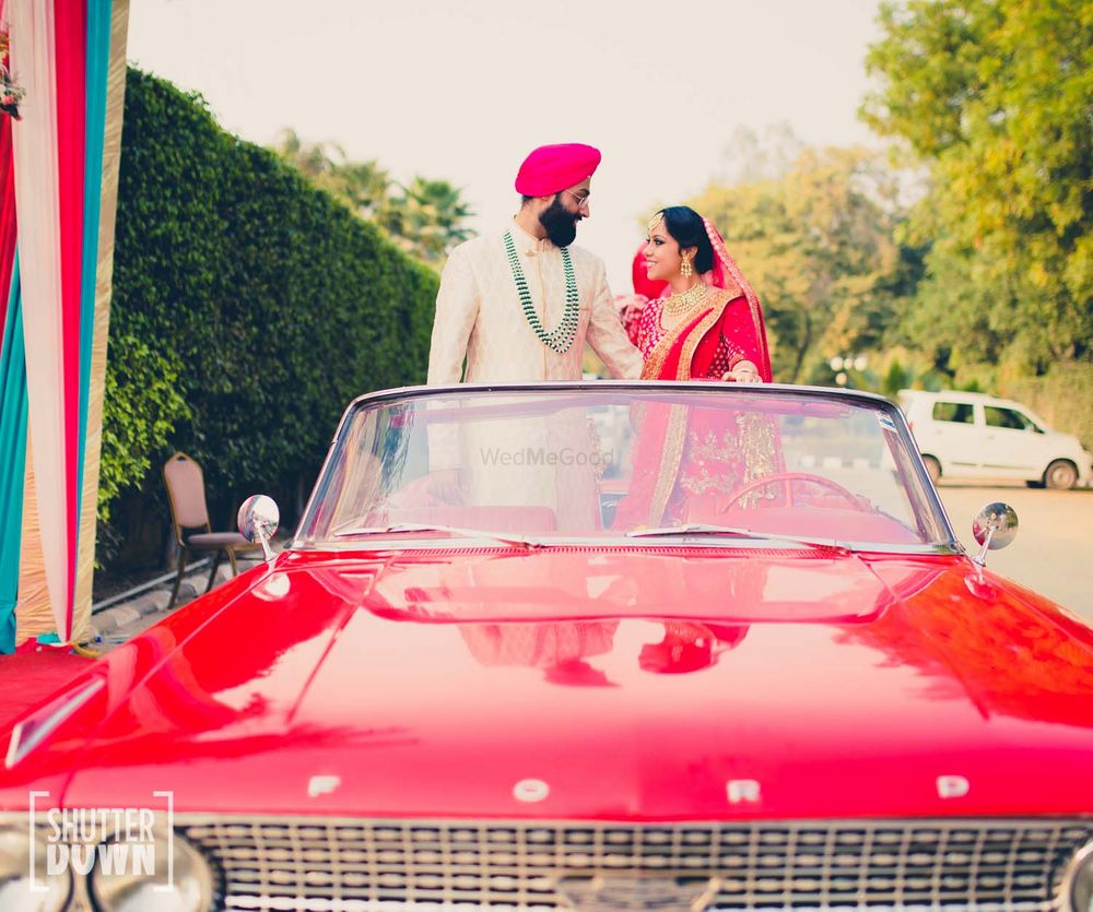 Photo of Sikh Couple Shot in a Car