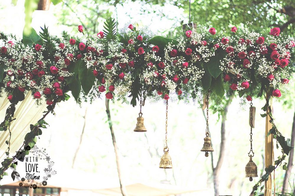 Photo of Pink and White Flowers Decor with Hanging Bells