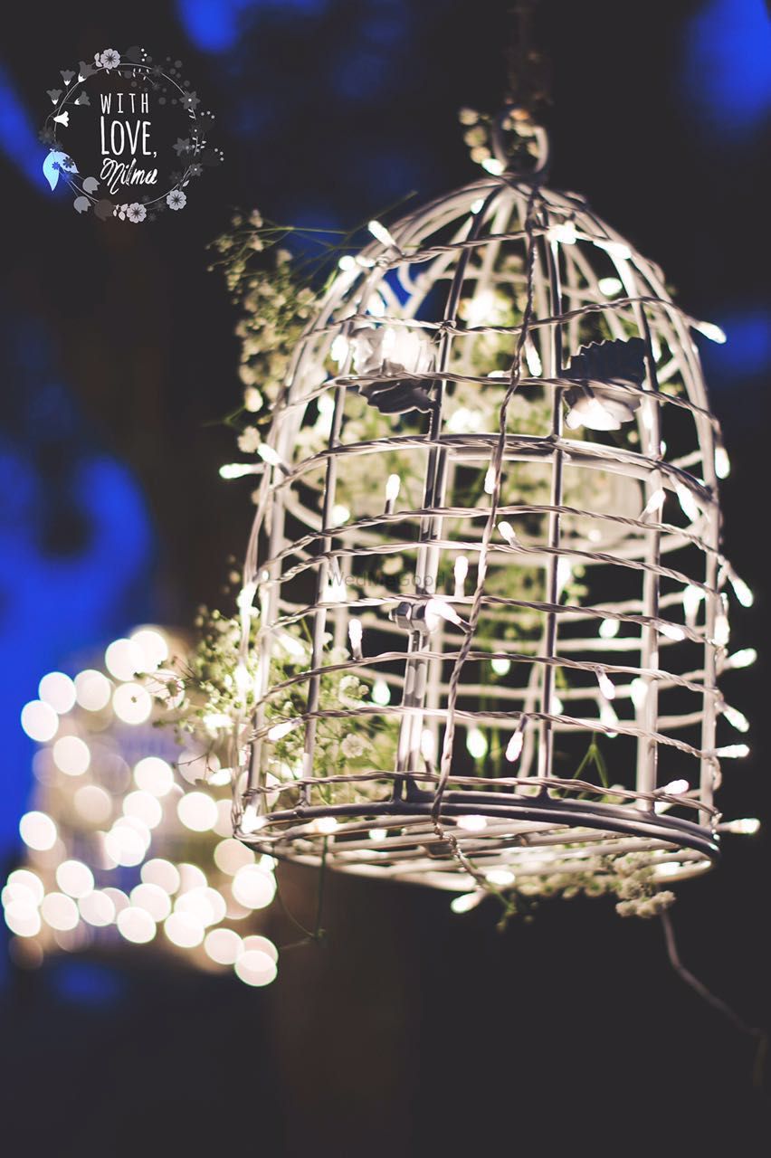 Photo of Silver Bird Cage Decor with Fairy Lights