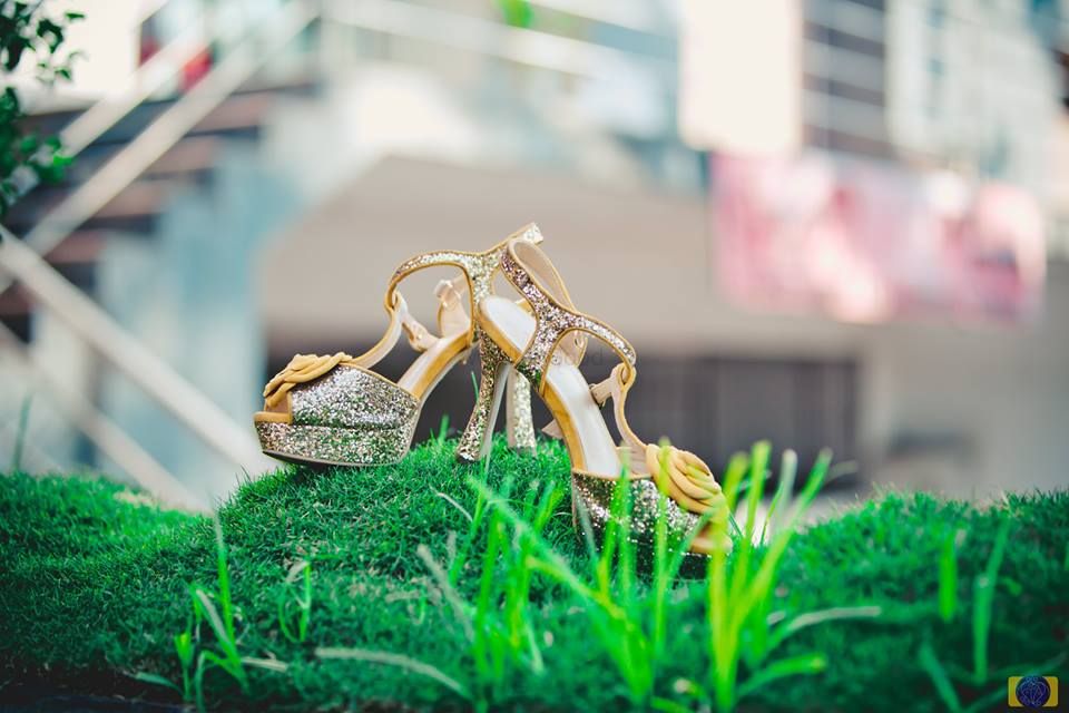 Photo of Silver Bridal shoes on grass