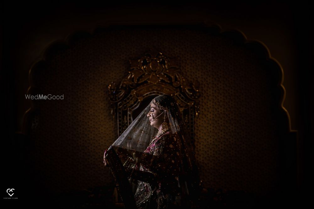 Photo of Bride under a veil shot