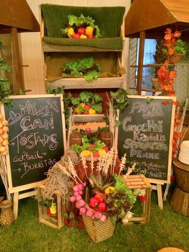 Photo of unique market setup with florals and fruit