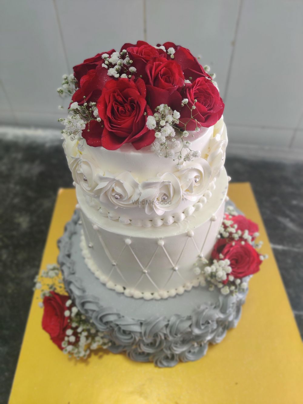 Photo From grey red and white theme cake - By Nicky's Cafe and Fine Pastries