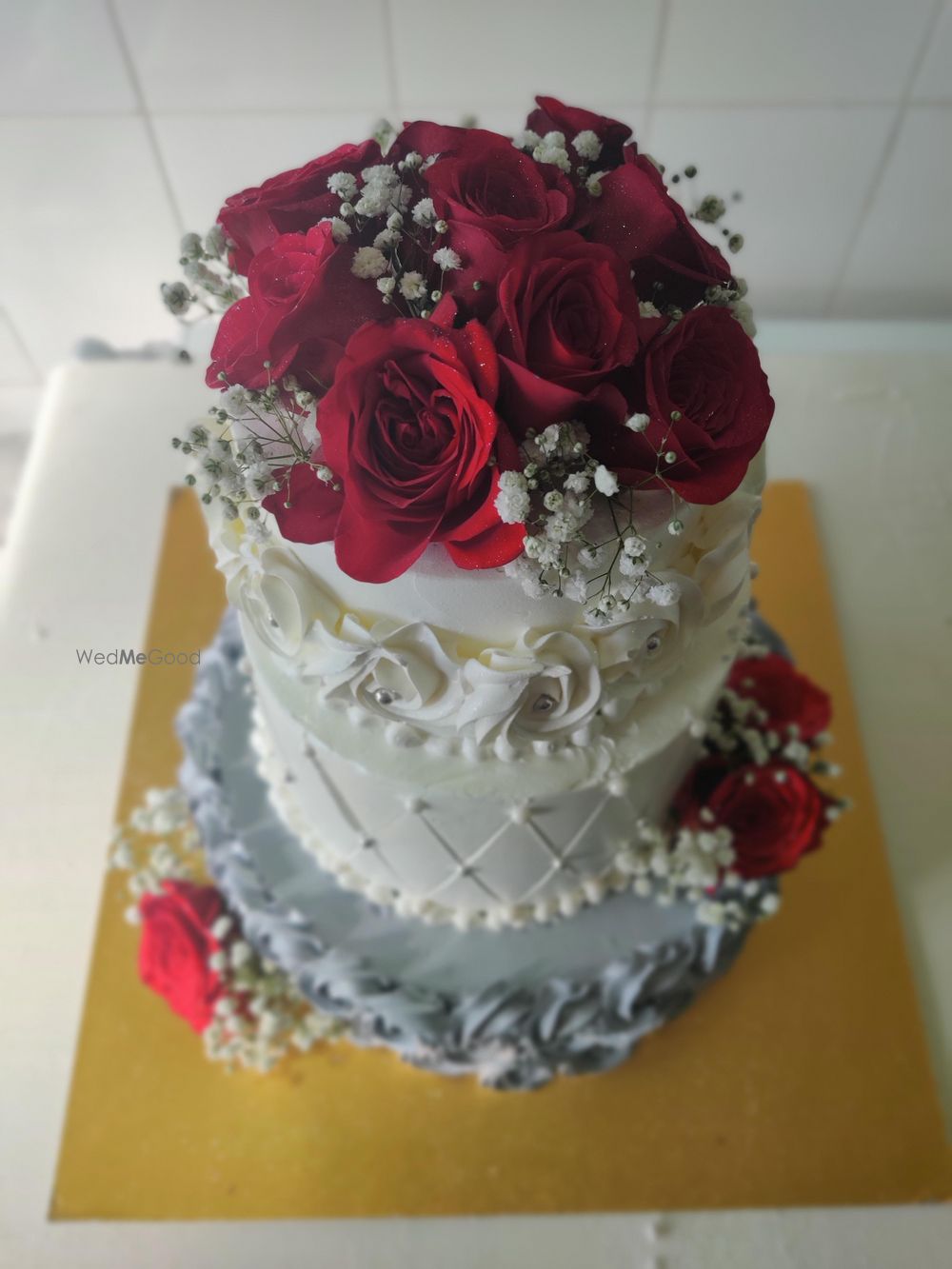 Photo From grey red and white theme cake - By Nicky's Cafe and Fine Pastries